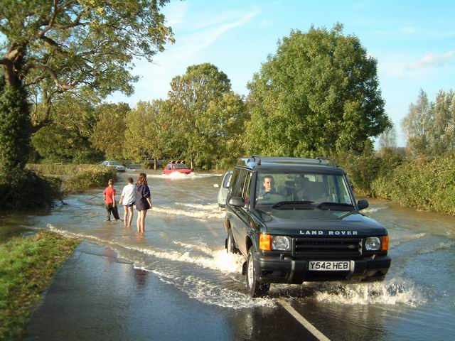 Floods - Cars crossing Mill Way