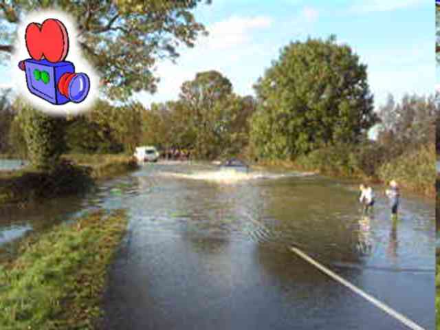 Floods - Cars crossing Mill Way